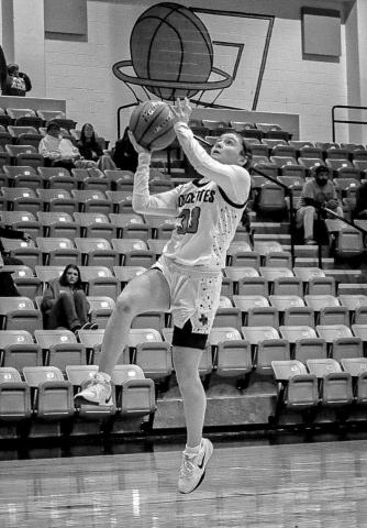 EASY BUCKETS - Levelland Loboette Presley Smith layed the ball up during the team’s game in the Andrews Tournament last week. (Staff photo by Aalijah Soliz)