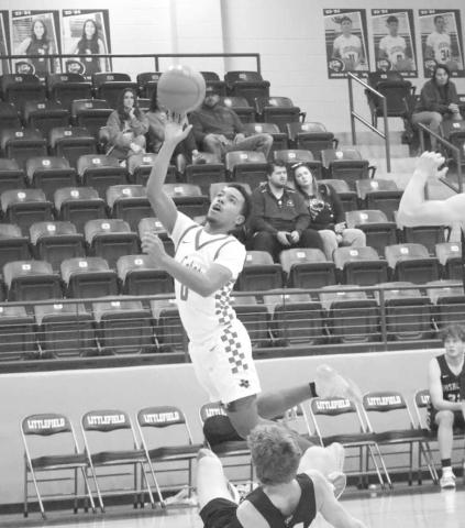 ATHLETIC FINISH - Levelland Lobo Jayden Castillo layed the ball up during the teams contest against the Bushland Falcons during the Littlefield Tournament last week. (Staff photo by Aalijah Soliz)
