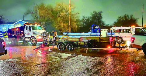 LATE NIGHT REPAIRS - The City of Levelland Water Department worked late into the night Thursday evening repairing leaks near Avenue D and 2nd Street, as well as 9th Street and Avenue E. Residents around the areas were informed that low water pressure could occur until the leaks were repaired. (Photo courtesy of City of Levelland)