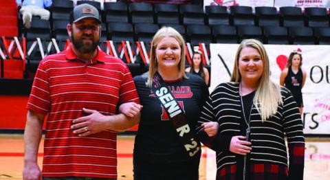 LOBOETTE SENIOR NIGHT- The Levelland Loboette volleyball program honored their seniors in their final home game Tuesday, October 25th. Loboette Madisyn Tidwell was escorted by her parents Marty and Chanda Tidwell. (Staff Photo by Dom Puente)