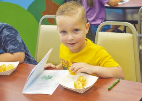 DOODLES AND DONUTS- The Hockley County Library Summer Program held this weeks event called Doodles and Dounuts. The participants were given a drawing book named Doodles and Donuts so each participant could take home. Pictured is Driscoll O’Hearon, one of the participants in the program. The Summer Reading Program’s last day will be Wednesday, July 31. (Photo courtesy of Emily Campos)