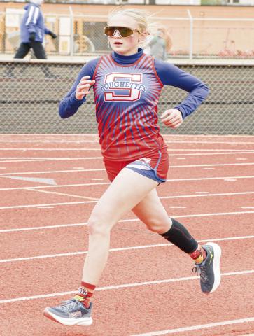 DISTANCE RUNNING MACHINE - Sundown’s Kaytlin Clausen races in the 3,200-meter run during the Son Qualls Relays this past Friday at Sudan High School. (Staff photo by Jentezen Smith)