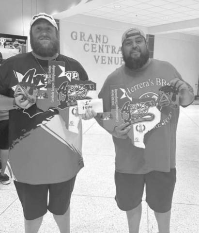 WINNERS - Gabriel Herrera and David Riddle won the Average Joe’s Cornhole Tournament this past month. (Photo courtesy of AJ Vigil)