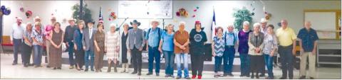 PROM TRADITION CREATED - The Hockley County Senior Citizen’s Association had a great turn out for their Senior Citizen Prom held on Friday at the Senior Citizen Dining Hall. Couples and friends lined up for a memorable picture before the party started. Hockley County Senior Citizen’s Director Shelly Baigen was excited to hold the first ever prom event and hopes it becomes an annual draw for senior citizens. (Staff photo by Hannah Woodrum)