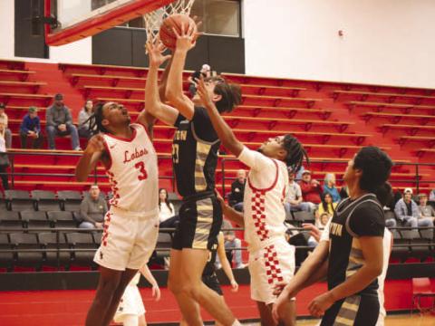 Levelland Lobo Eryk Jones blocked the ball during the teams game against the number two ranked team in 1A where they fell short against Jayton Jaybirds. (Staff photo by Aalijah Soliz)