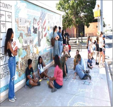 FUN AT THE LIBRARY – The library hosted Chalk Day on Wednesday as part of their summer reading program. Participants had fun outside and there were plenty of hopscotch and Tic-Tac-Toe games to go around. (Staff photo by Ada Niederhauser)