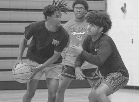 JAB-STEP - Levelland athlete Zyon Golightly tried getting around his defender Jacobi Shaw this past Monday at the Levelland Middle School during open gym practice. (Staff photo by Aalijah Soliz)