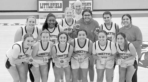 LITTLEFIELD CHAMPS- The Levelland Loboettes wrapped up their tournament portion of their schedule with a first-place finish in the Littlefield Basketball Tournament. The Loboettes were off Tuesday, but will return to the court January 6th for their district opener in Big Spring. (Photo Courtesy of Derek Lopez)