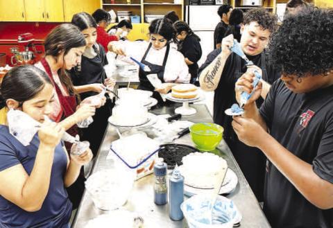 MAKING COOKIES- Levelland High School culinary students in Khris Oaks’ class have been sharpening their knives and decorating skills for the upcoming cake competitions to come up with elegant delectable creations. (Levelland ISD photo)
