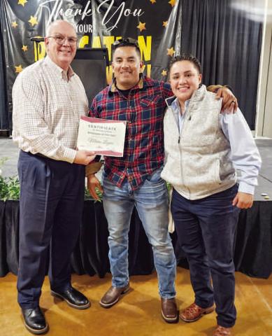 EMPLOYEE OFTHEYEARAWARD - During the City of Levelland’s Employee Appreciation Banquet, Thalia Guerrero presented the Employee of the Year Award. The recipient of the award was LPD’s Captain Mateo Lopez. Guerrero shared the positive impact Lopez has had on her throughout the past year as she has undergone an internship with the department. Pictured is City Manager James Fisher alongside Lopez and Guerrero. (Staff photo by Dom Puente)