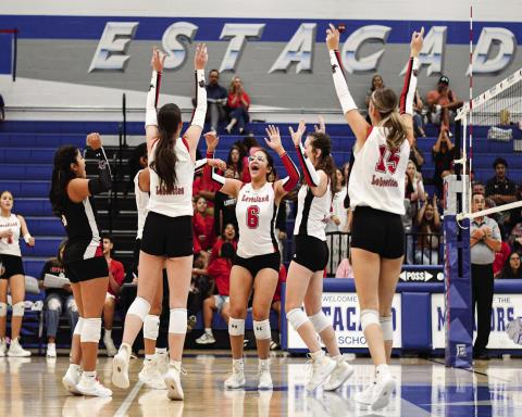 POINT FOR THE LOBOETTES - The Levelland Loboettes volleyball team celebrates after scoring a point in their match against Lubbock Estacado this past Tuesday at Estacado High School. The Loboettes would later go on to sweep Estacado. (Staff photo by Jentezen Smith)