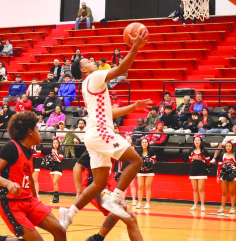 Levelland Lobo Jayden Castillo layed the ball up off of a Brownfield turnover during the teams contest. (Staff photo by Aalijah Soliz)