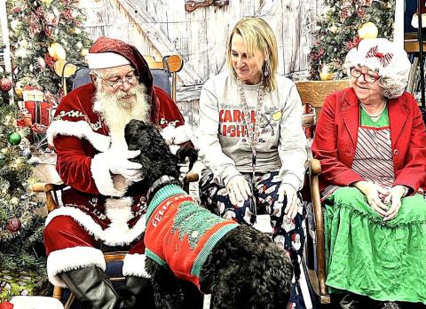 SMYER SANTA- Smyer ISD had a visit from Santa Claus and Mrs. Claus and Pepper the therapy dog. (Smyer ISD Facebook)