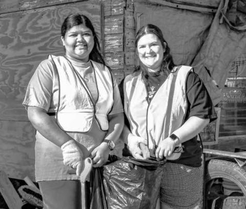 SPRING CLEANING - Pictured together are Jasmine Jasso (left) and Danika Conde (right) who volunteered their time to help clean up along Highway 114 this past Saturday during the Keep Levelland Beautiful Spring Cleanup. (Staff photo by Hannah Woodrum)