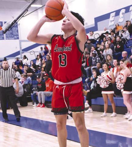 CORNER ATTEMPT- Moving to 1-1 in district play, the Levelland Lobos fell to the Estacado Matadors, 67-50, in Lubbock Tuesday. Lobo Neamiah Campos is pictured attempting a corner three during the contest. (Photo Courtesy of Edward Ramirez)