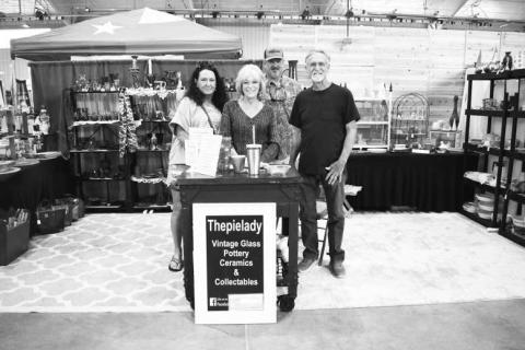 SHOPPINGAND SOCIALIZING - Pictured are Michelle Wischkaemper, Gail Kennedy, Hockley County Sheriff Chris Wischkaemper and BJ Kennedy who were found conversing at a booth on Saturday at the Yucca Blossom Trade Day event at the Mallet Event Center. (Staff Photo by Ada Niederhauser)