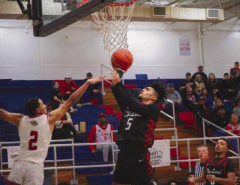 TOUGH SHOT - Levelland Lobo Sean Landrum layed the ball up during the teams season opener against the Plainview Bulldogs as the away team. The Lobos played against the Dimmitt Bobcats this Tuesday at home for their second game of the season. (Staff photo by Aalijah Soliz)