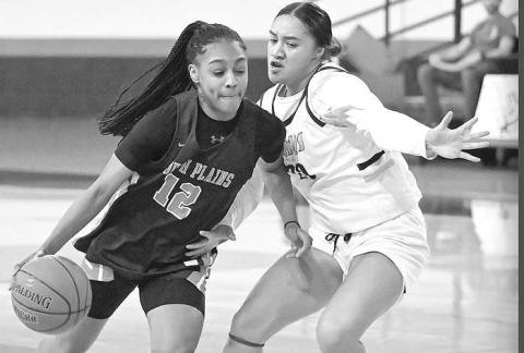 HOME WIN- Lady Texan Daiysha Brown drove to the basket for two of her four points in a win against Lamar College Thursday at the Texan Dome. (Photo Courtesy of Jordan Irvine)