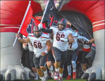 RUN-OUT - The Levelland Lobos ran out of their tunnel before their away game against the Estacado Matadors this past Friday. The Lobos will face-off against the San Angelo Lakeview Chiefs this Friday as the away team at 7 p.m. (Staff photo by Dom Puente)