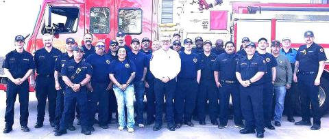1 LFD BRUSH TRUCK GROUP- The Levelland Fire Department held it Brush Truck Roll-in on Tuesday, with the firefighting team pushing B-15 in the fire station bay. Chief Brian Horton later presented awards to several firefighters for their dedication to the department and community for a job well done . (Levelland Fire Department photo)