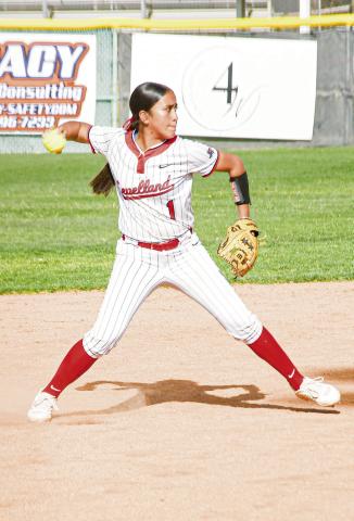 GET THE OUT - Levelland Loboette Madilyn Barrientes fields a groundball and makes the throw to get an out during their district softball game against Liberty this past Tuesday at Levelland High School. (Staff photo by Jentezen Smith)