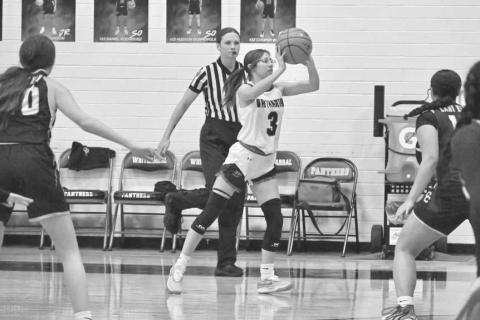 OUTLET PASS - Whitharral Lady Panther Elizabeth Reyna passed the ball down the court to her teammate during the team’s first district game in their win. (Photo courtesy of Whitharral ISD)