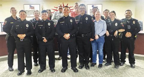 WELCOME ABOARD! - The Levelland Police Department welcomed four new officers to their ranks last week. Pictured front and center is Officer Guerrero, Officer Salinas, Officer Lazcano and Officer Corely. Officers Guerrero, Salinas and Lazcamo were issued their Oath of Office courtesy of Municipal Court Judge Esmeralda Rowand while City Secretary Andrea Corley issued the Oath of Officer to her husband Officer Corley. (Staff photo by Hannah Woodrum)