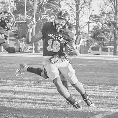 CLOSE CALL - Morton Indian Brayden Villarreal ran down the sideline narrowly staying inbounds this past Friday during the team’s homecoming game against the Slaton Tigers. (Staff photo by Aalijah Soliz)