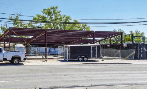 - Construction of Head Hunters Smoke Shop is moving along as the steel framing of the building has been placed. The business will be replacing the torn down Nothin’ Butt Smokes building located at 203 College Avenue. (Staff photo by Evin Thomas)