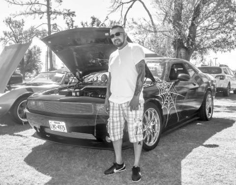 2014 DODGE CHALLANGER- Pictured is Junior Ramirez with his 2014 Dodge Challanger who was one of the many participants who entered the Thunder on the Plains Car Show on Saturday at the Levelland City Park. ( Photo courtesy of Emily Campos)