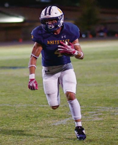 FULL SPEED AHEAD - Junior Jaxon Hodge rushes the football with a head of steam for Whiteface during their Homecoming game against Springlake-Earth this past Friday. Hodge would rush for 203 yards and score five total touchdowns in the Antelopes 82-48 win. (Staff photo by Jentezen Smith)