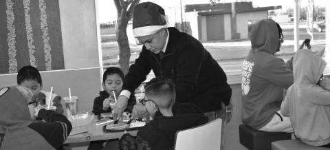 PANCAKE BREAKFAST - Local law enforcement personnel helped serve children breakfast at McDonald’s last Saturday as part of the the Blue Santa Event that hosted 29 children from the Levelland area. (Staff photo by Emily Campos)