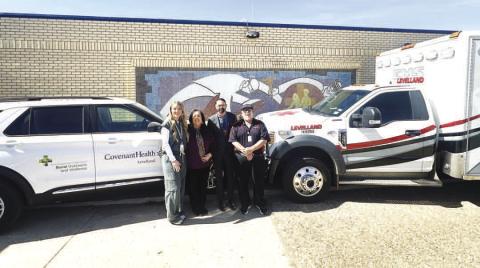 OUTREACH VEHICLE-- Covenant Healthcare in Levelland launched its Rural Outreach and Wellness Program with a new non-emergency mobile unit vehicle. Shown are Autumn Home, RN and Covenant ER supervisor, County Judge Sharla Baldridge, Newman Wheeler, Covenant Levelland chief administrator, and Pat Vigil, RN and EMS director. (Staff photo by Shelby Radford)