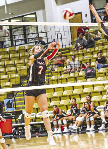 FAKE OUT - Levelland Loboette Addisen Campbell faked the set up to her teammates and hit the ball over the net to get the Loboettes a point in their contest this past Tuesday in Andrews. (Staff photo by Aalijah Soliz)