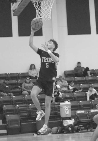FASTBREAK - Morton Indian Jaeden Alvarado scored the easy layup during the team’s fastbreak against the Klondike Cougars on the road. (Staff photo by Aalijah Soliz)
